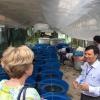 Rector Anne De Paepe inspecteert aquacultuur-projecten aan de Can Tho University in Vietnam. Bio-ingenieur Patrick Sorgeloos initieerde de projecten vanaf de jaren 1980 (© UGent, foto Isaac Demey, collectie Beeldbank).