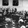 Uitreiking van de Nobelprijs aan Corneel Heymans in de Aula op 10 januari 1940. Links op de foto koningin Elisabeth naast een lege troon voor koning Leopold III, afwezig omwille van de oorlogsdreiging (Collectie Universiteitsarchief Gent).